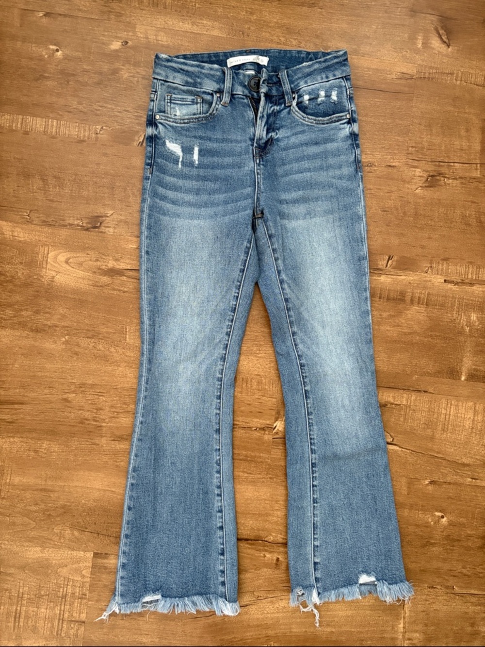 Altar'd State Light Blue Distressed Flare Jeans with Frayed Hem